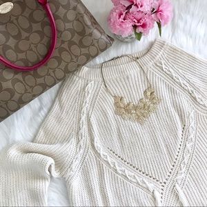 Listicle tassle sweater